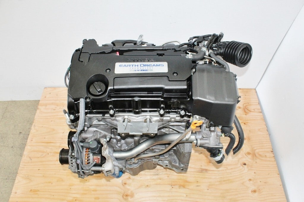 Honda Earth Dreams engine on wooden platform, auto engine part, clean and detailed view