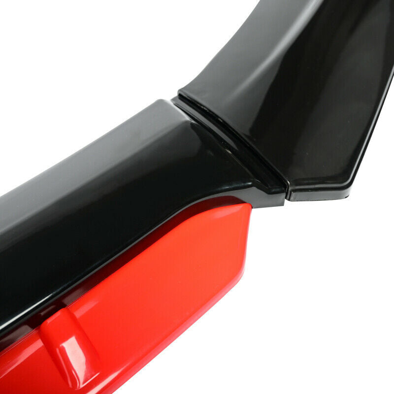 Glossy black and red car spoiler close-up, aerodynamic auto body part