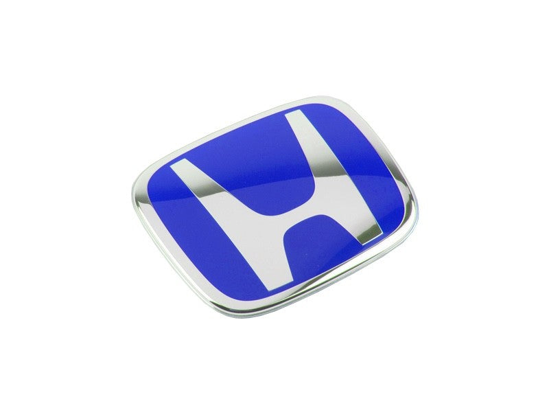Blue and chrome Honda car emblem badge on white background